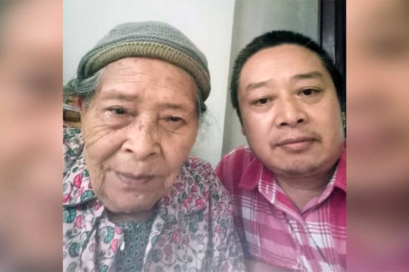 Chinese dissident Chen Yunfei, right, and his mother are shown in an undated photo.