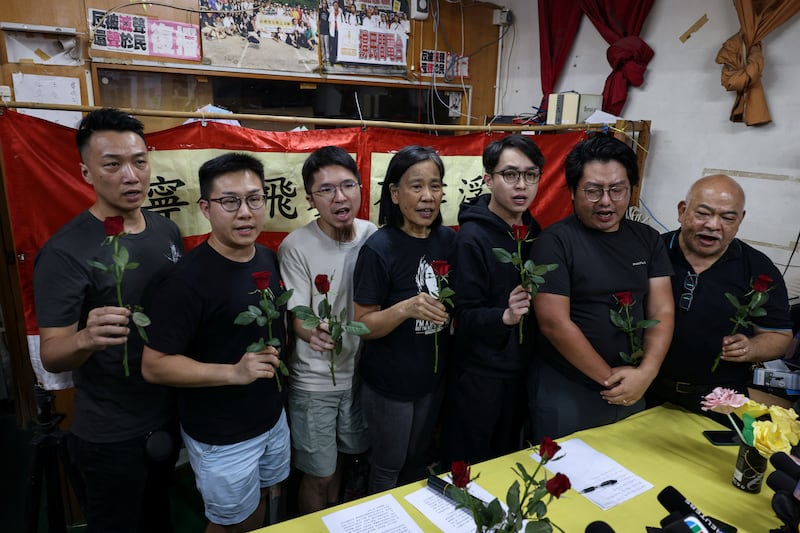 Chan Po-ying, Chair of Hong Kong’s League of Social Democrats, along with party members, announces the party’s dissolution in Hong Kong, June 29, 2025.